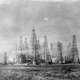 Image for article titled These Landscapes Covered In Oil Wells Are Like Huge Alien Cities